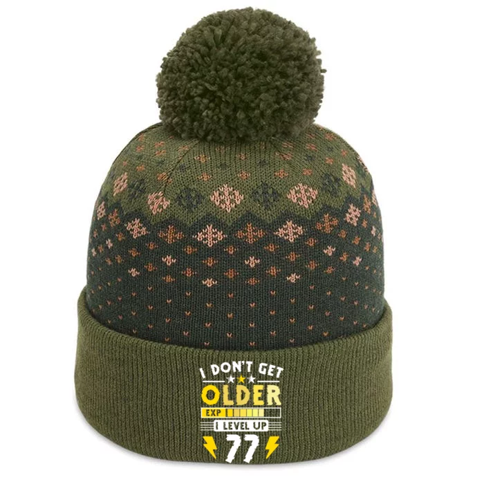 77th Birthday I Dont Get Older I Level Up 77 Years Gift The Baniff Cuffed Pom Beanie