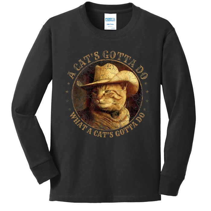 At Cowboy A CatS Gotta Do Funny Cat With Cowboy Hat Kids Long Sleeve Shirt