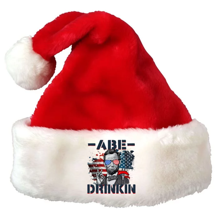 Abe Drinkin 4th Of July President Drinking Funny Premium Christmas Santa Hat