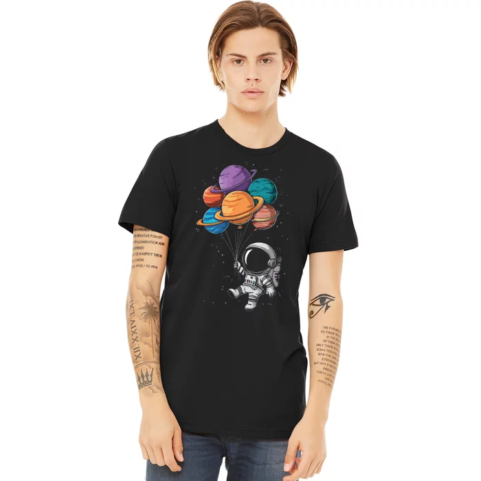 Astronaut Holding Planet Balloons Floating In Space Premium T-Shirt