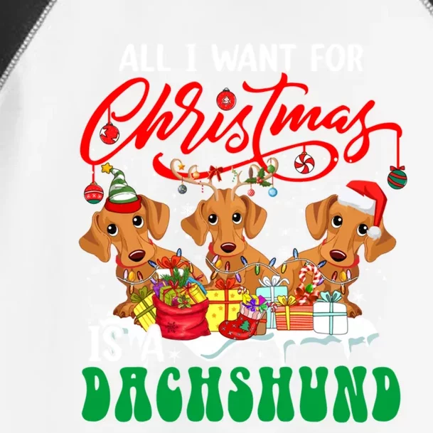 All I Want For Xmas Is A Dachshund Three Santa Reindeer Dogs Gift Toddler Fine Jersey T-Shirt