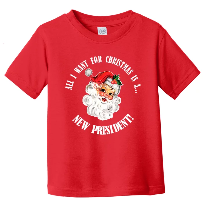 All I Want For Christmas Is A New President Funny Word Play Toddler T-Shirt