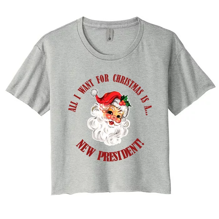 All I Want For Christmas Is A New President Funny Word Play Women's Crop Top Tee