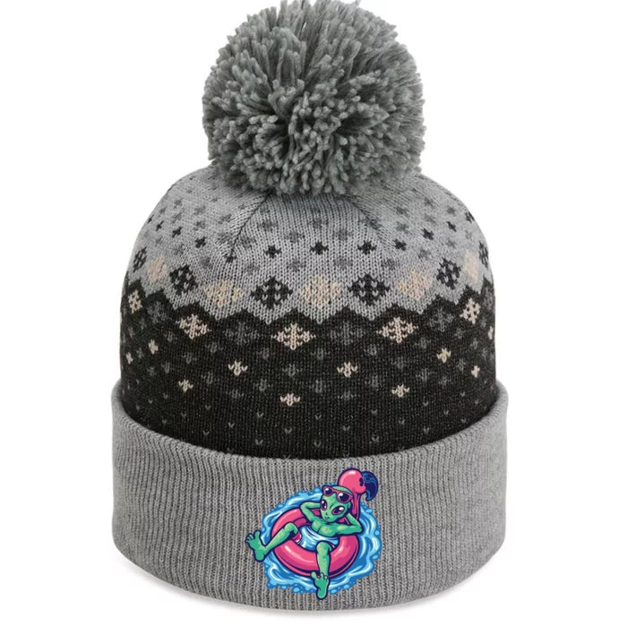 Alien On Flamingo Floaty Funny The Baniff Cuffed Pom Beanie