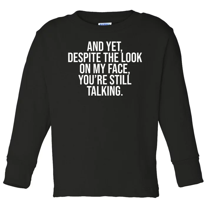 And Yet Despite The Look On My Face YouRe Still Talking Funny Toddler Long Sleeve Shirt