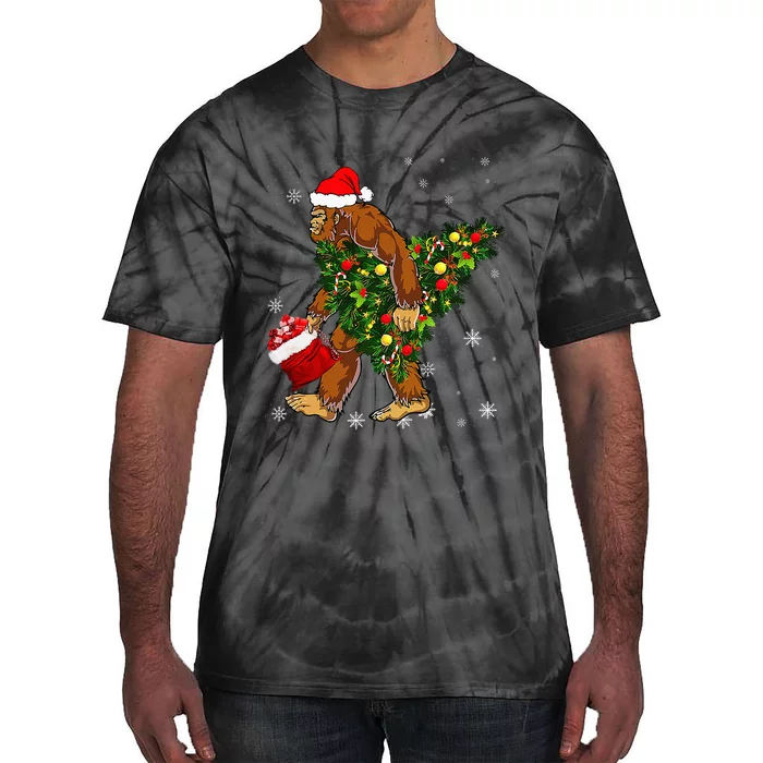 Bigfoot Carrying Christmas Tree Sasquatch Believer Pajama Tie-Dye T-Shirt