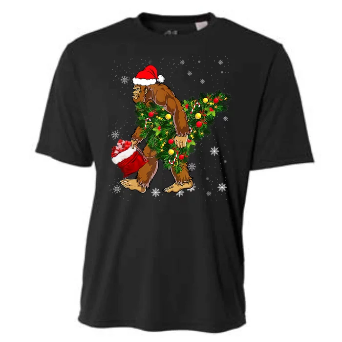 Bigfoot Carrying Christmas Tree Sasquatch Believer Pajama Cooling Performance Crew T-Shirt