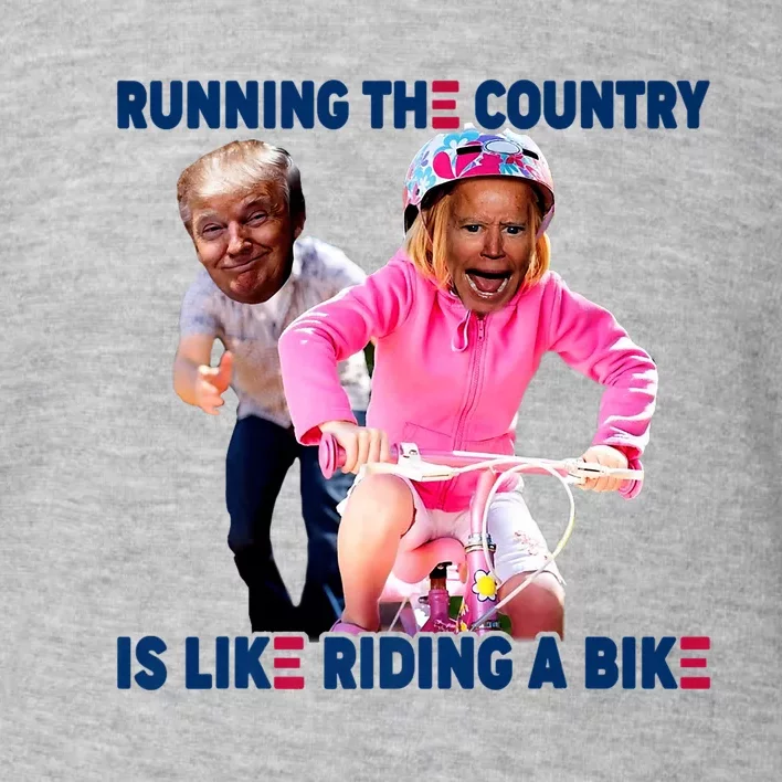 Biden Falls Off Bike Trump Funny Joe Biden Falling Of Bike Biden Trending Toddler Sweatshirt