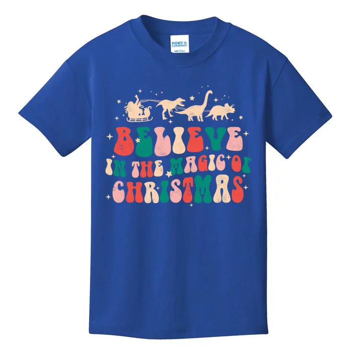 Believe In The Magic Of Christmas Groovy Retro Xmas Dinosaur Cool Gift Kids T-Shirt