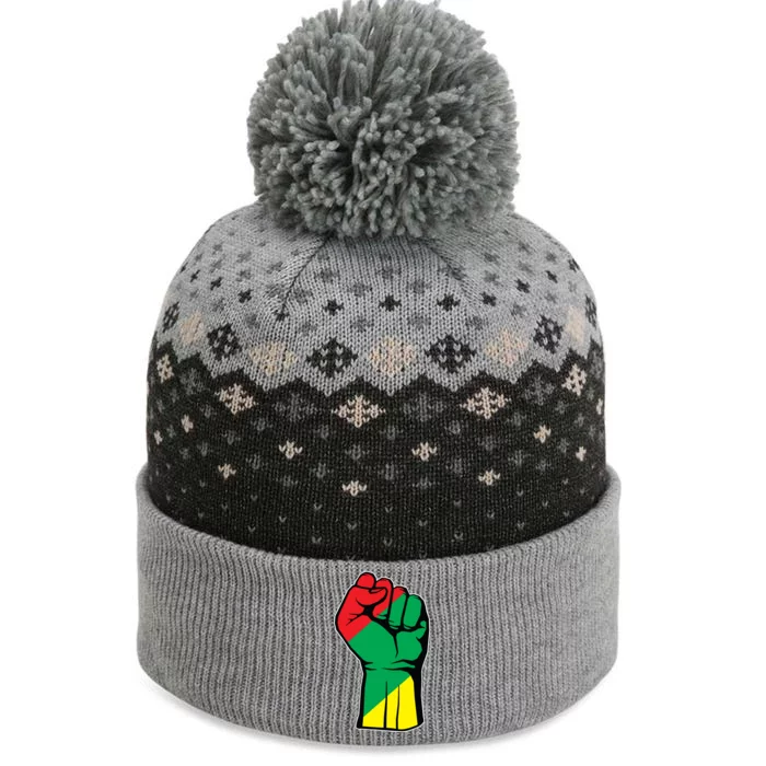 Black History Oppression Fist The Baniff Cuffed Pom Beanie