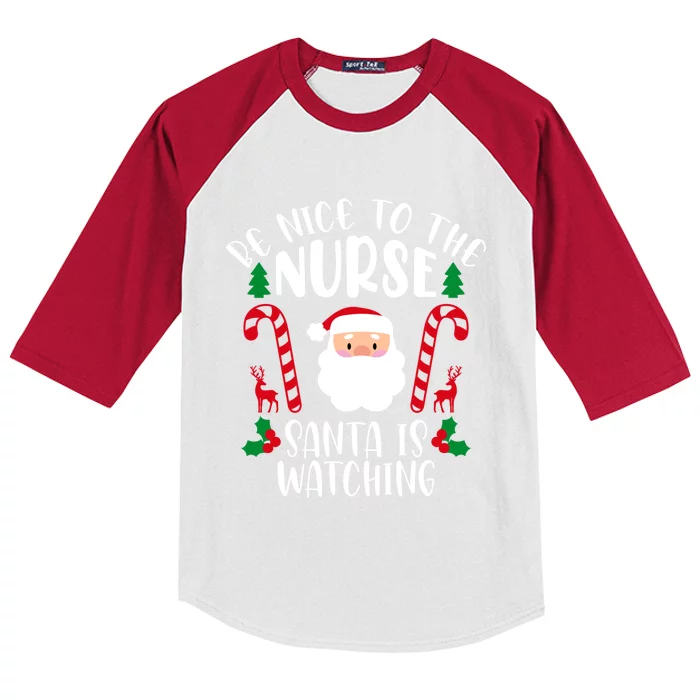 Be Nice To The Nurse Santa Is Watching Funny Xmas Jokes Gift Kids Colorblock Raglan Jersey