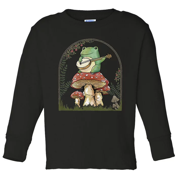 Cottagecore Aesthetic Frog Playing Banjo on Mushroom Cute Toddler Long Sleeve Shirt