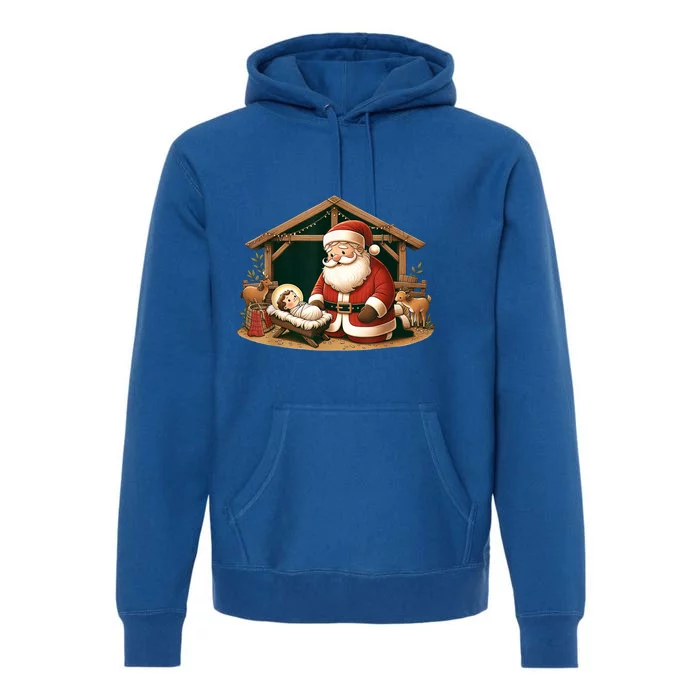 Christmas Design Kneeling Santa Claus With Jesus Cool Gift Premium Hoodie