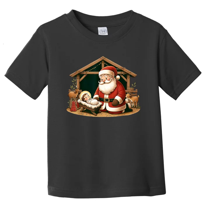 Christmas Design Kneeling Santa Claus With Baby Jesus Toddler T-Shirt