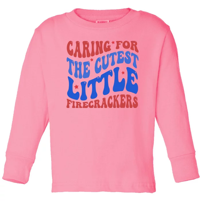 Caring For The Cutest Little Firecrackers 4th Of July Toddler Long Sleeve Shirt