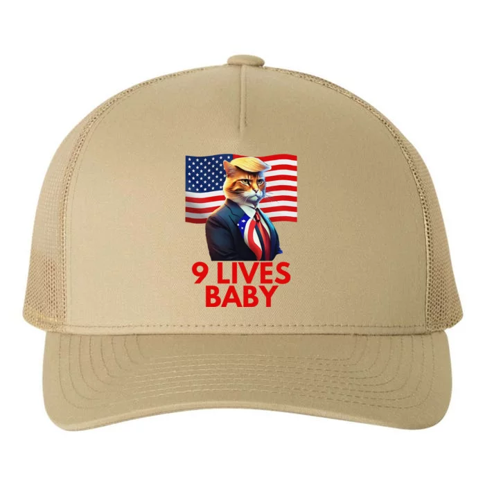 Cat In Suite With Trump Hair American Flag Nine Lives Baby Yupoong Adult 5-Panel Trucker Hat