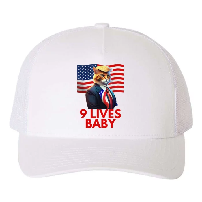 Cat In Suite With Trump Hair American Flag Nine Lives Baby Yupoong Adult 5-Panel Trucker Hat