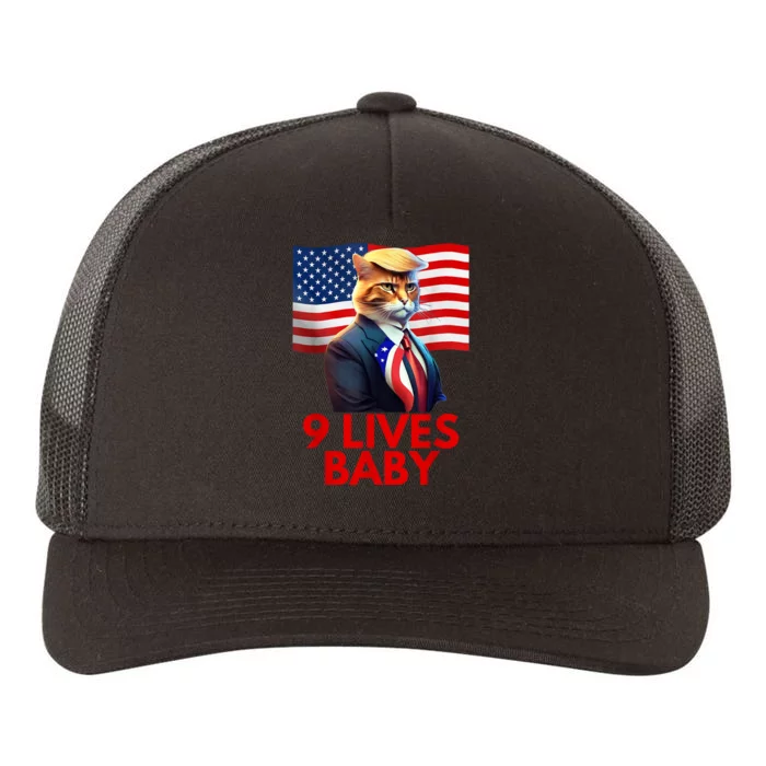 Cat In Suite With Trump Hair American Flag Nine Lives Baby Yupoong Adult 5-Panel Trucker Hat