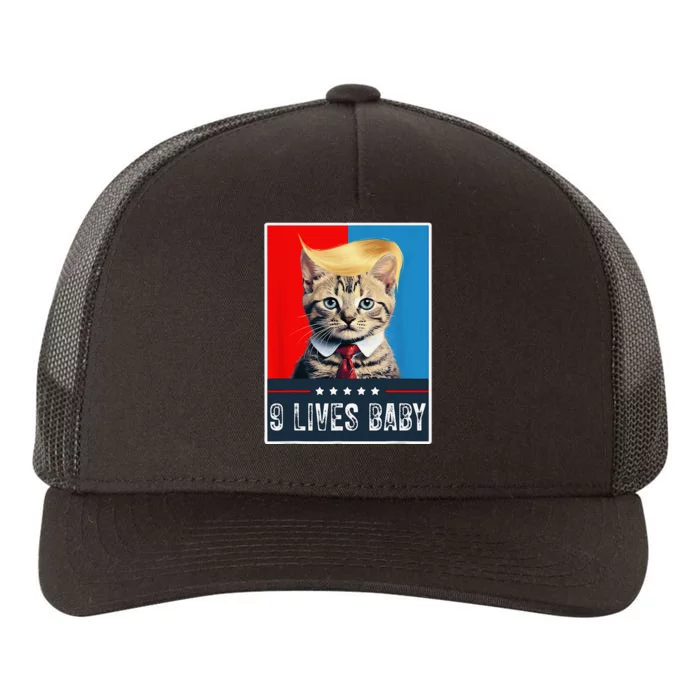 Cat In Suite With Trump Hair American Flag Nine Lives Baby Yupoong Adult 5-Panel Trucker Hat