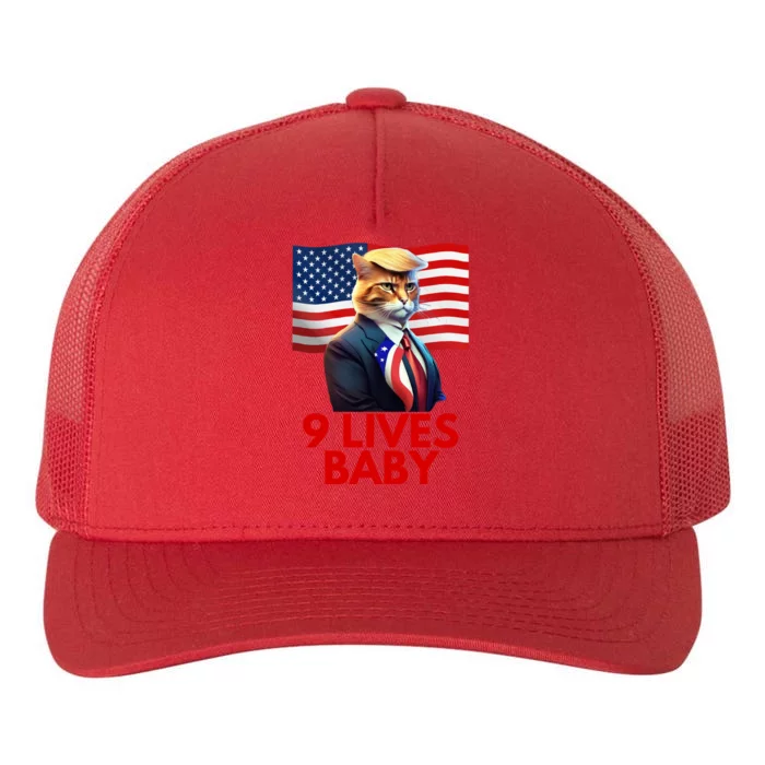 Cat In Suite With Trump Hair American Flag Nine Lives Baby Yupoong Adult 5-Panel Trucker Hat