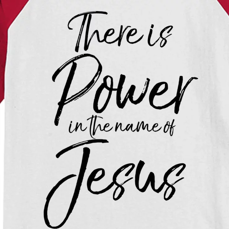 Christian Quote Gift There Is Power In The Name Of Jesus Gift Kids Colorblock Raglan Jersey