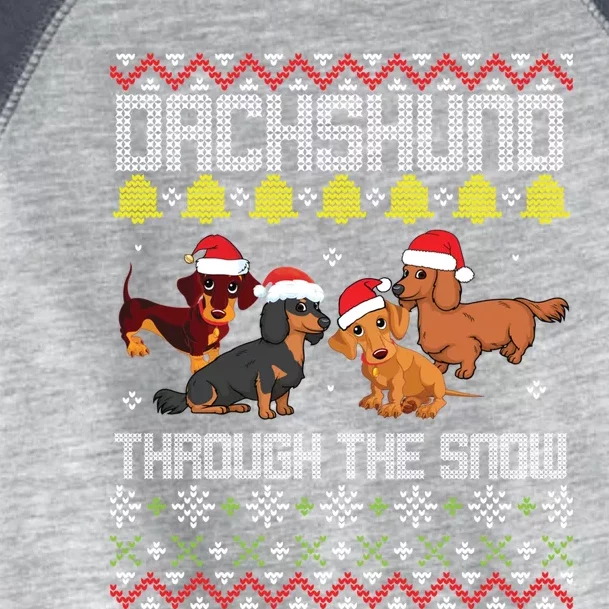 Dachshund Dogs With Noel Costume Dancing Through The Snow Gift Toddler Fine Jersey T-Shirt