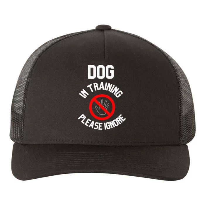 Dog In Training Please Ignore Yupoong Adult 5-Panel Trucker Hat