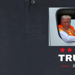 Donald Trump Rides In Garbage Truck Softstyle Adult Sport Polo