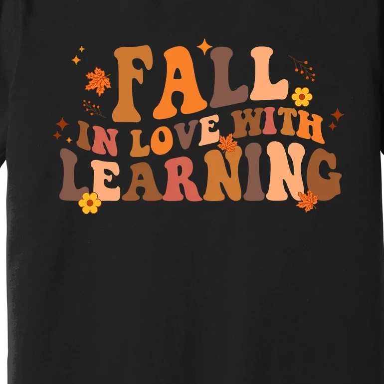 Fall In Love With Learning Fall Teacher Thanksgiving Groovy Premium T-Shirt