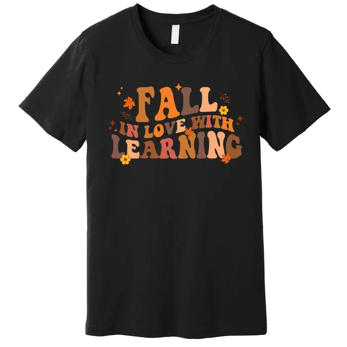 Fall In Love With Learning Fall Teacher Thanksgiving Groovy Premium T-Shirt