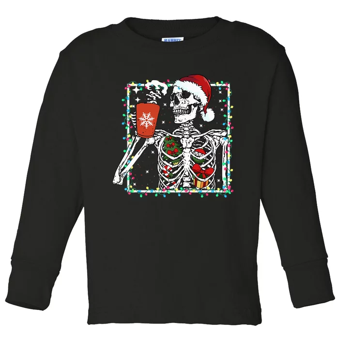 Festive Skeleton Sipping Coffee Latte in Christmas Theme Toddler Long Sleeve Shirt