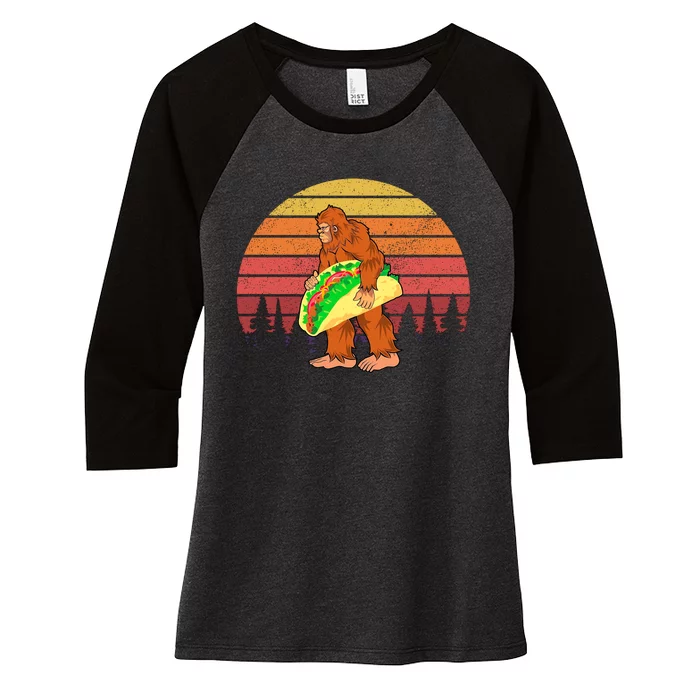 Funny Bigfoot Holding A Taco Women's Tri-Blend 3/4-Sleeve Raglan Shirt