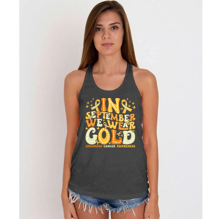 Groovy In September We Wear Gold Childhood Cancer Awareness Women's Knotted Racerback Tank