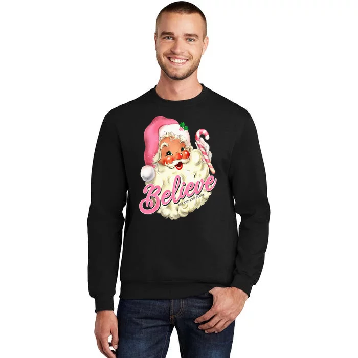 Groovy Vintage Pink Santa Claus Believe Christmas Sweatshirt