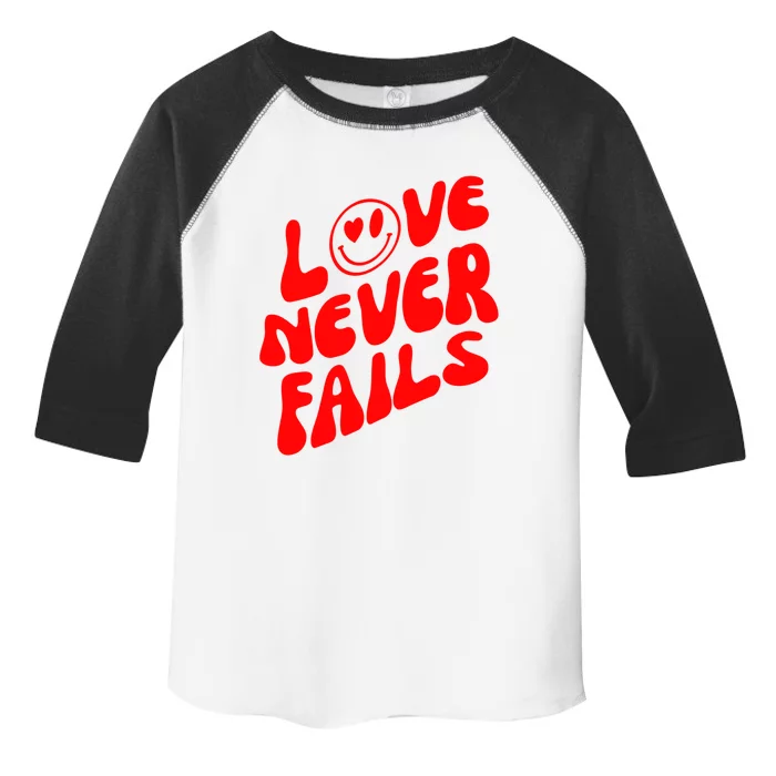 Happy Face Christian Hearts Love Never Fails Valentines Day Gift Toddler Fine Jersey T-Shirt