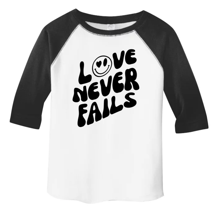 Happy Face Christian Hearts Love Never Fails Valentines Day Funny Gift Toddler Fine Jersey T-Shirt