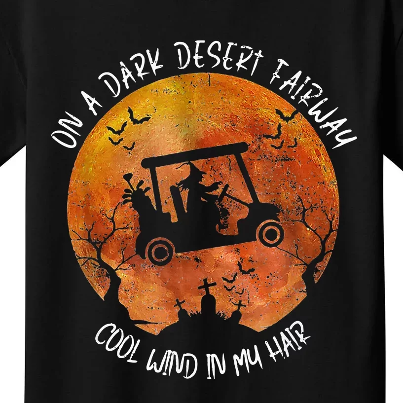 Halloween Witch Riding Golf Cart On A Dark Desert Fairway Kids T-Shirt