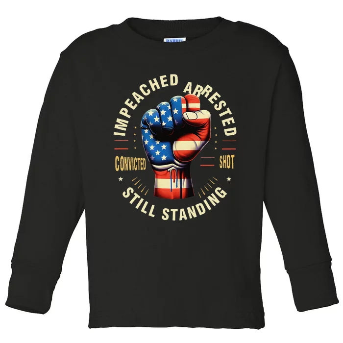 Impeached Arrested Convicted Shot Still Standing Design Toddler Long Sleeve Shirt