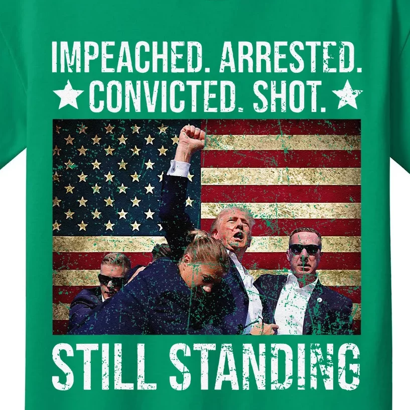 Impeached Arrested Convicted Shot Still Standing Kids T-Shirt