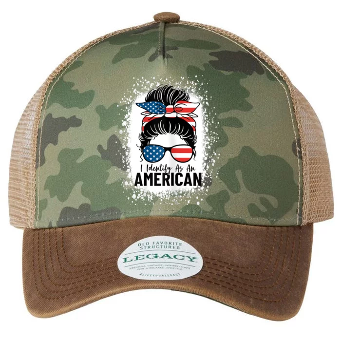 I Identify As An American Messy Bun Patriotic American Legacy Tie Dye Trucker Hat