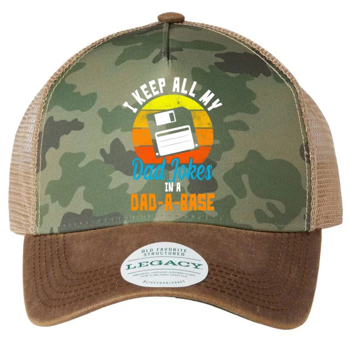 I Keep All My Dad Jokes In A Dad A Base Vintage Sunset Legacy Tie Dye Trucker Hat