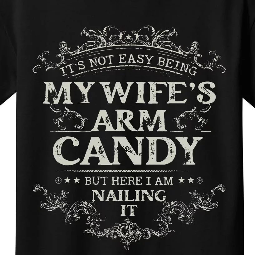 Its Not Easy Being My Wifes Arm Candy Kids T-Shirt