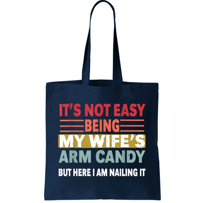 Its Not Easy Being My Wifes Arm Candy But Here I Am Nailin Tote Bag