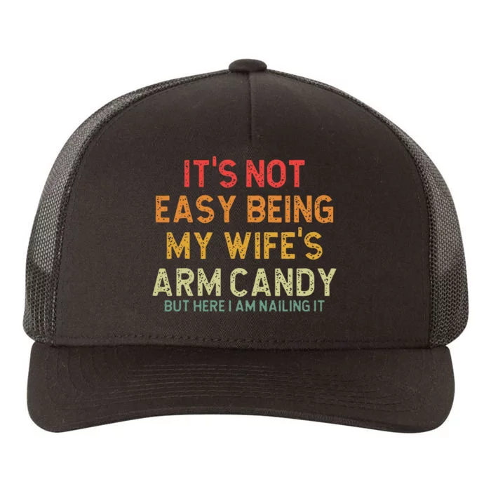 Its Not Easy Being My Wifes Arm Candy But Here I Am Nailin Yupoong Adult 5-Panel Trucker Hat