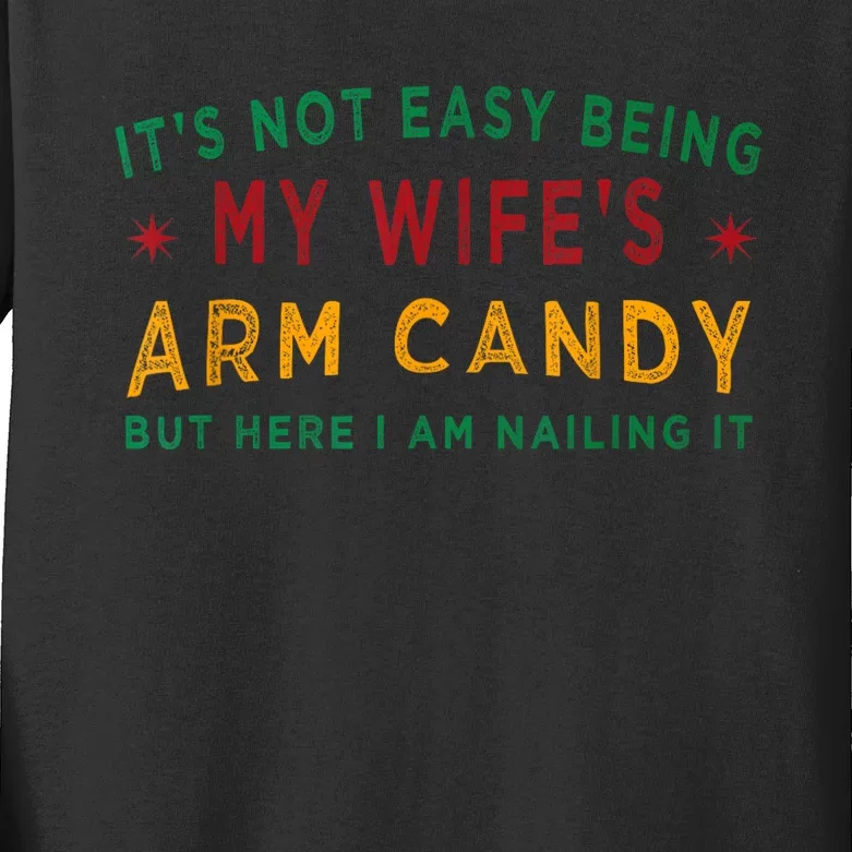 Its Not Easy Being My Wifes Arm Candy Funny Fathers Day Kids Long Sleeve Shirt