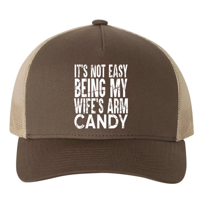 Its Not Easy Being My Wifes Arm Candy Yupoong Adult 5-Panel Trucker Hat