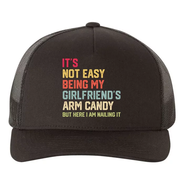 Its Not Easy Being My Girlfriends Arm Candy Retro Yupoong Adult 5-Panel Trucker Hat