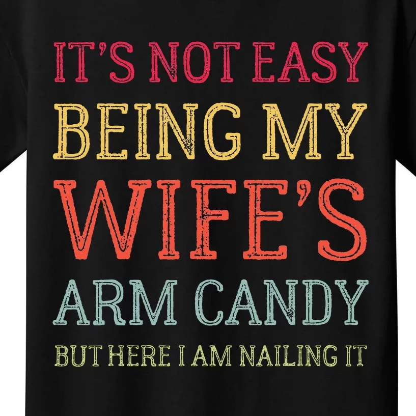 ItS Not Easy Being My WifeS Arm Candy Retro Funny Husband Kids T-Shirt