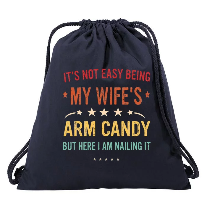 Its Not Easy Being My Wifes Arm Candy Here I Am Nailing It Drawstring Bag