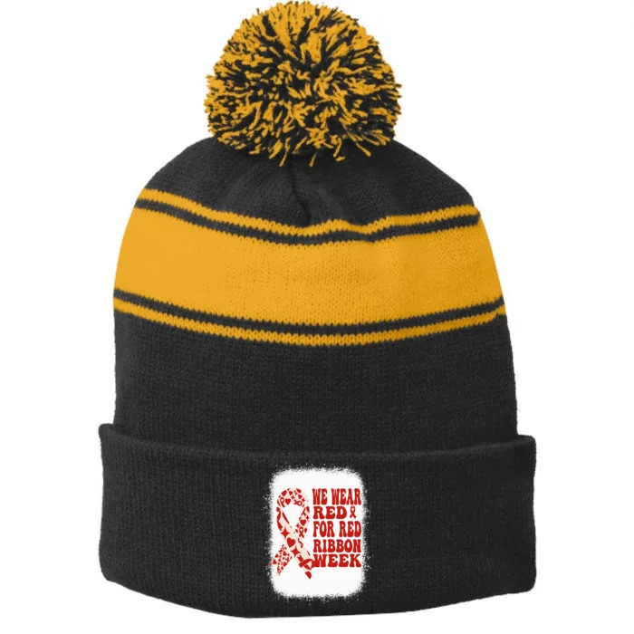 In October We Wear Red Ribbon Week Awareness Stripe Pom Pom Beanie